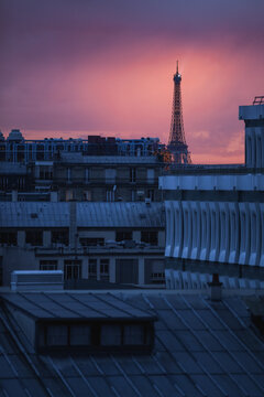 Roof top sunset in Paris, Eiffel Tower in the background