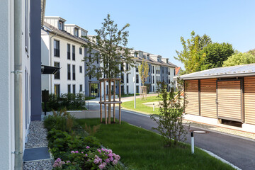 Modern apartment buildings in a green residential area in the city - 375184543