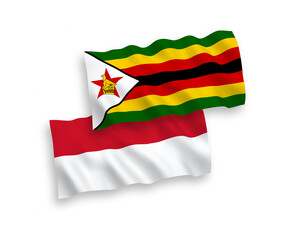 Flags of Indonesia and Zimbabwe on a white background