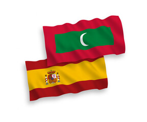 Flags of Maldives and Spain on a white background