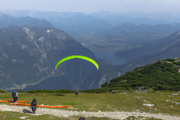 A paraglider at the start of the Krippenstein mountain in the Dachstein area,Austria.Paraglide...