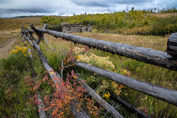 Fototapeta premium Scenic fall landscape with log fences in The Grand Tetons.