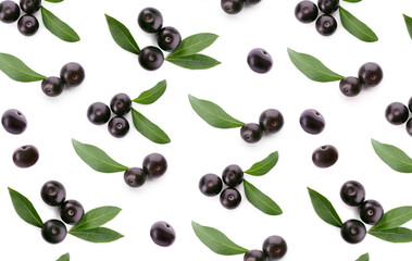 Set of fresh acai berries with green leaves on white background