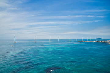 Clean and clear sea and wind power generator. Jeju Island.