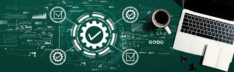 Quality control approval with a laptop computer on a desk