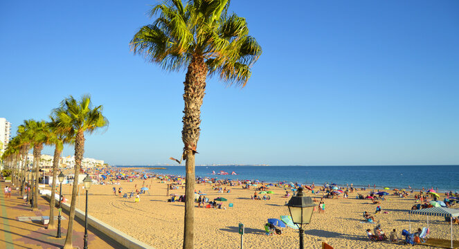 Seafront promenade and Costilla Beach (Playa de la Costilla) in Rota, Costa de la Luz, Cadiz, Spain