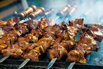 juicy shish kebab on coals on skewers