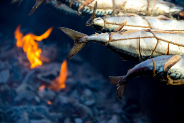 fish is baked on the grill