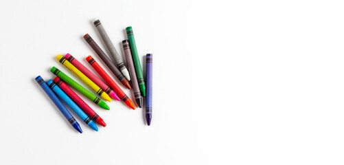 Wax crayons on a white sheet
