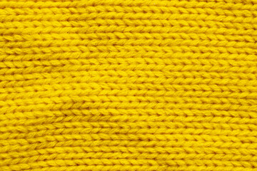 Yellow knitting wool texture background
