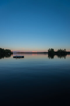 Clear Skies and a Peaceful Nothern Lake at Dusk