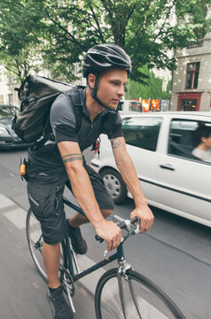 Bicycle Messenger in Car Traffic