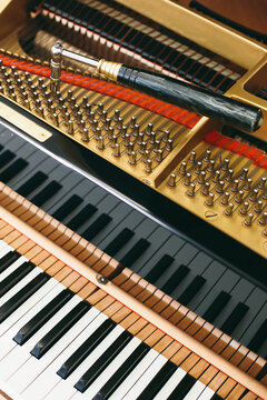 Keyboard and mechanics of a piano