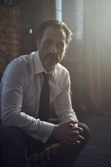 cinematic photo shoot of the confident actor celebrity look in foggy loft room