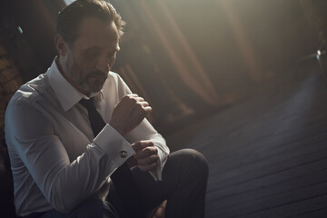 cinematic photo shoot of the confident actor celebrity look in foggy loft room