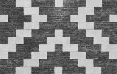 Grey brick with white stone composite wall as background (Black and White)