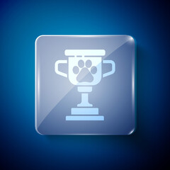 White Pet award symbol icon isolated on blue background. Medal with dog footprint as pets exhibition winner concept. Square glass panels. Vector.