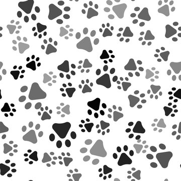 Black Paw print icon isolated seamless pattern on white background. Dog or cat paw print. Animal track. Vector.