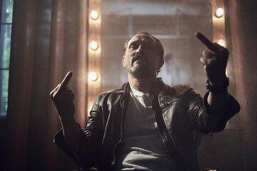 cinematic photo shoot of the confident actor celebrity look in foggy loft room