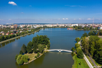 Fototapeta na wymiar Big public lake and an island in the center of Ivano-Frankovsk city aerial view.