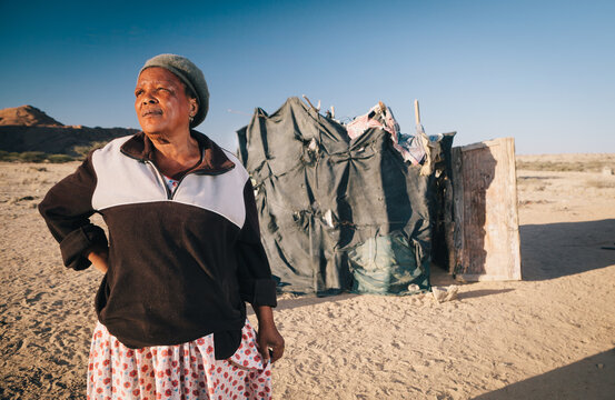 Portrait of an African Damara woman in Spitzkoppe, Namibia
