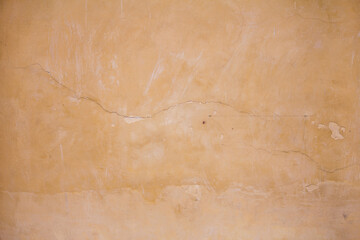 Cream color old wall background and texture with free space