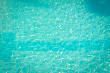 Blue water in swimming pool background 