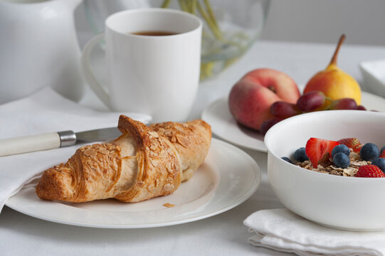 Healthy Breakfast Croissant Muesli And Fruit With Tea