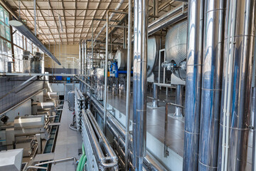 Stainless steel equipment for wine at modern winery.