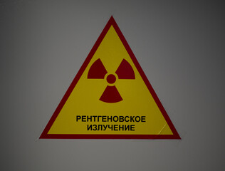 Close-up an x-ray warning sign. Translation into English - 