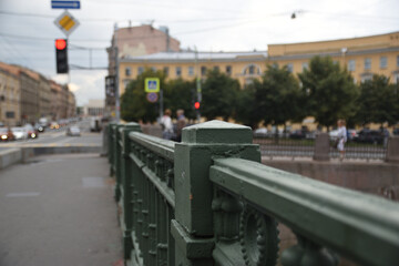 Fototapeta premium Old cast iron fence on a bridge in a big city