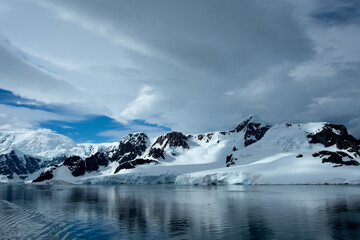 Fototapeta na wymiar Glaciers in Antarctica with dramatic sky