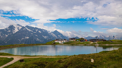 Beautiful alpine summer view with reflections in a lake at the famous Penken summit, Mayrhofen, Tyrol, Austria