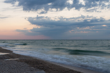 Beautiful  seascape. Dawn at  stormy sea. Image