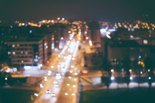 Defocused aerial view of an intersection of the city of Lleida, Spain