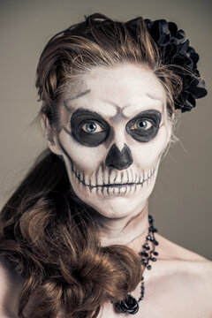 Woman Painted as a Frightening Skeleton
