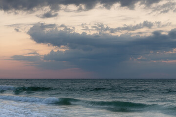 Beautiful  seascape. Dawn at  stormy sea. Image