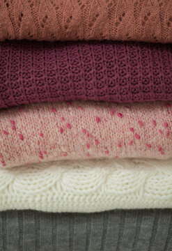 Pile of Sweaters as a Background