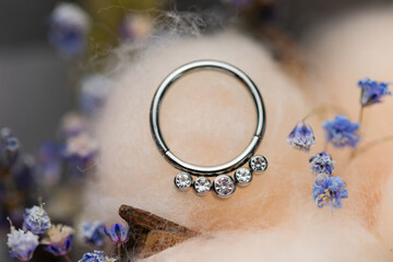 Beautiful piercing jewelry. Macro shot. Selective focus.