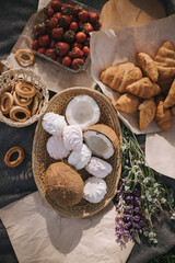 Picnic in the park with sweets and fruits