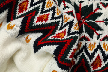 Knitted sweater on whole background, close up