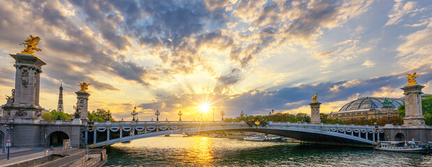 Famous Alexandre III bridge in Paris at sunset