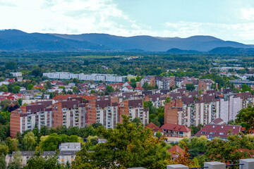 Obraz premium Bird's-eye view of the tiled roofs of an old European city