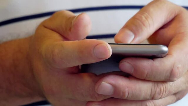 modern technologies.Closeup human hands touching smartphone screen.