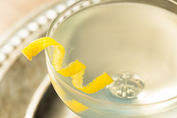 Refreshing Dry Martini with a Lemon Garnish