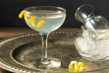 Refreshing Dry Martini with a Lemon Garnish