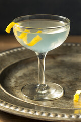 Refreshing Dry Martini with a Lemon Garnish