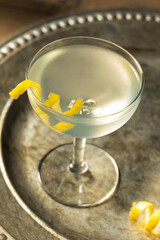 Refreshing Dry Martini with a Lemon Garnish