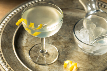 Refreshing Dry Martini with a Lemon Garnish