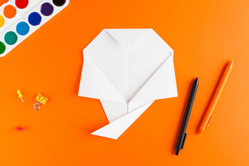 Step-by-step instructions for origami paper casting for Halloween. Step 10. DIY for all saints ' day.